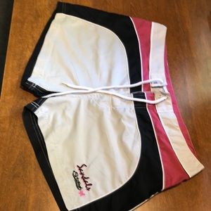 Grey, pink and black board shorts